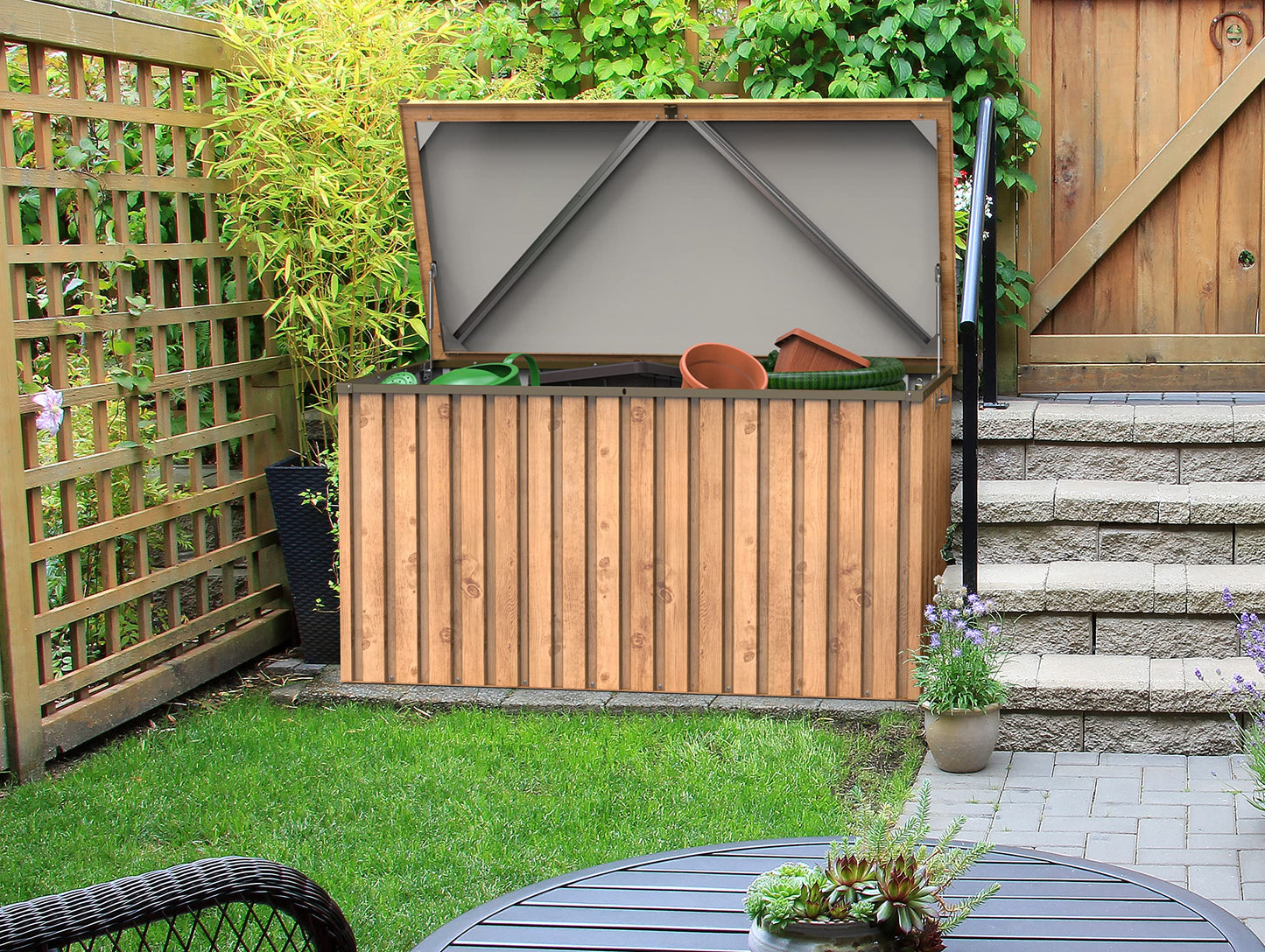 Duramax DH 1.7 Metal Cushion Box (770 L) with Hydraulic Gas Cylinder & Padlock Eye, Outdoor Deck Box and Garden Furniture Organizer, Woodgrain & Brown Trimmings