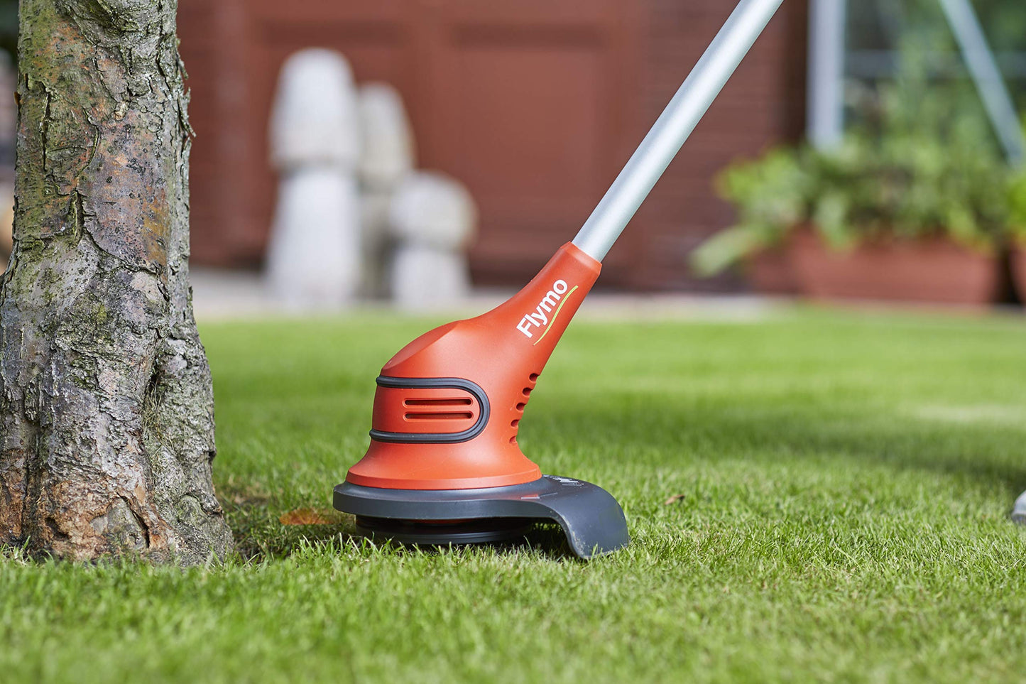 Flymo SimpliTrim Li Cordless Battery Grass Trimmer - Ultra Lightweight 14.4 V Li-Ion Battery Integrated Including Charger), 23 cm Cutting Width, Durable Long Life Blades, Orange and Grey