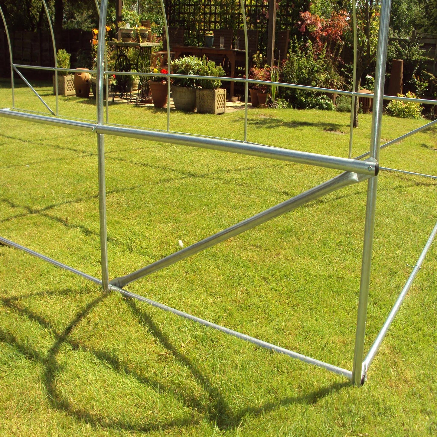 Frame Only 6m x 3m Polytunnel"Strongest In It's Class" a fully Galvanised Structure with more Diagonal & Roof Bracing than all others. Metal Hinged Door | Groundbar Kit.